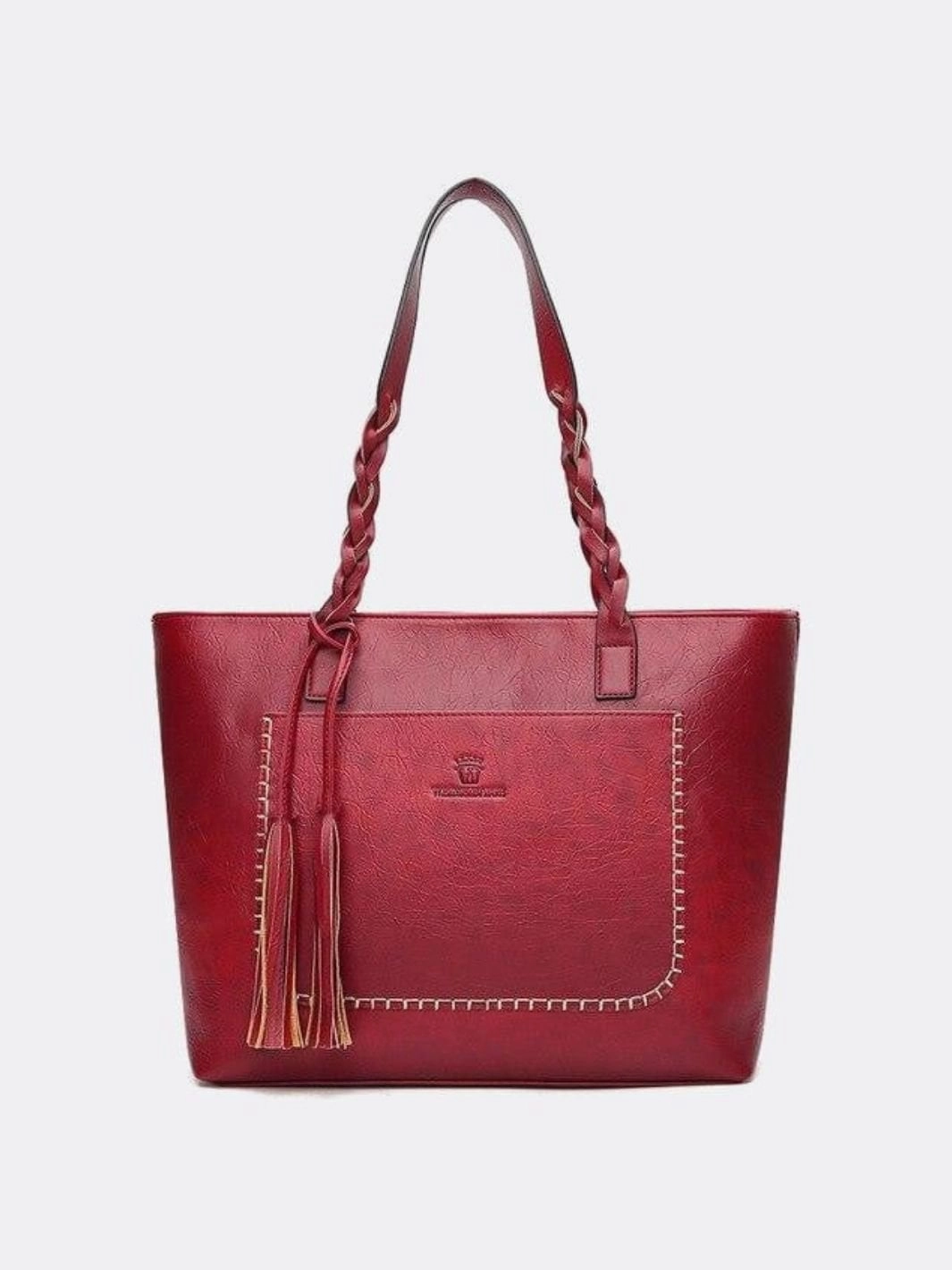 Boho Leather Tote Bag ?C Braided Straps & Tassel Charm Sleek Form Sustainable Innovation