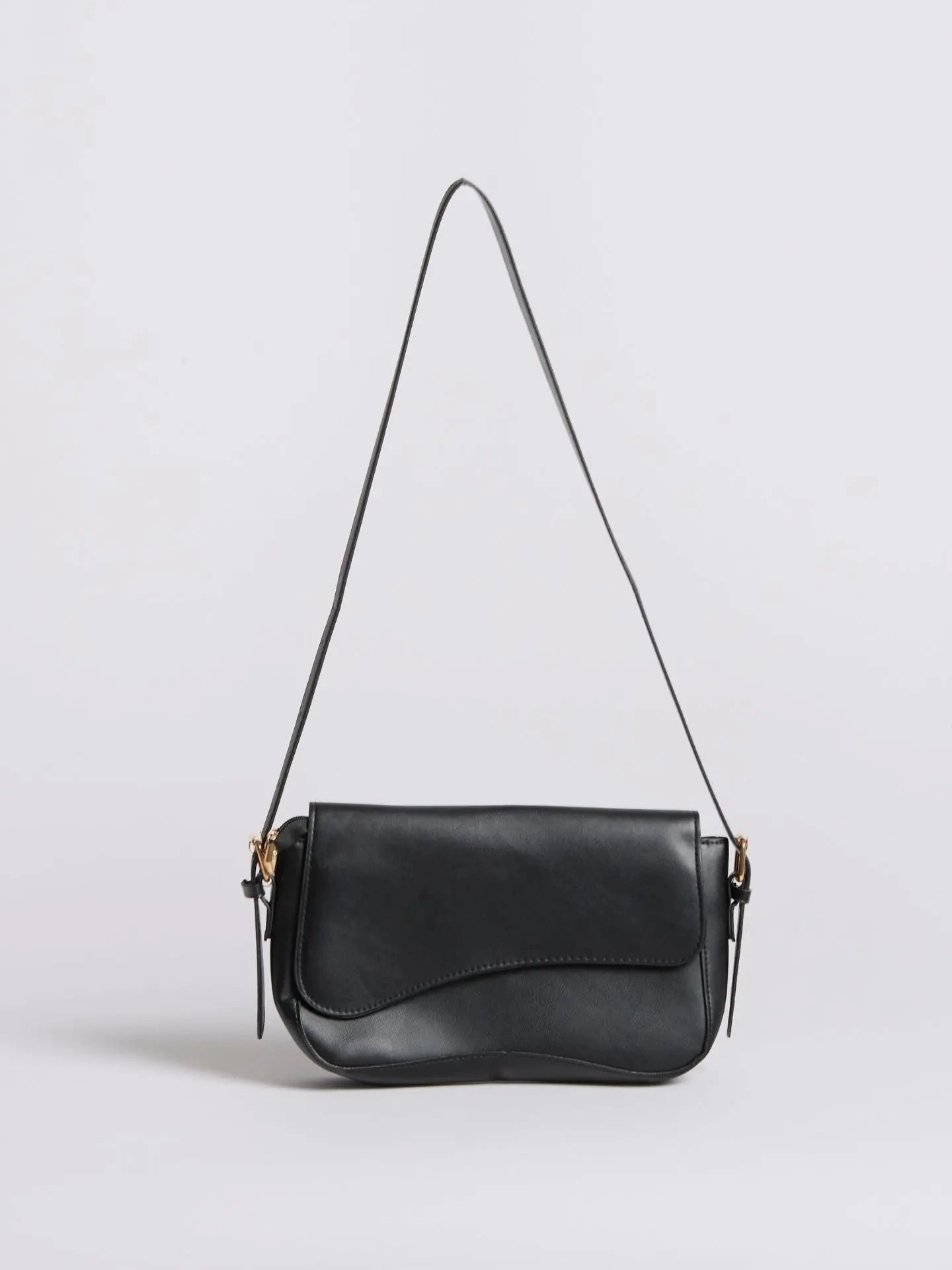 Comfortable strap that distributes weight evenly Celeste | Black Leather Shoulder Bag ?C Sleek & Modern