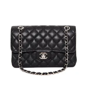 Luxury Precision CHANEL 11.12 Classic black flap bag in caviar leather