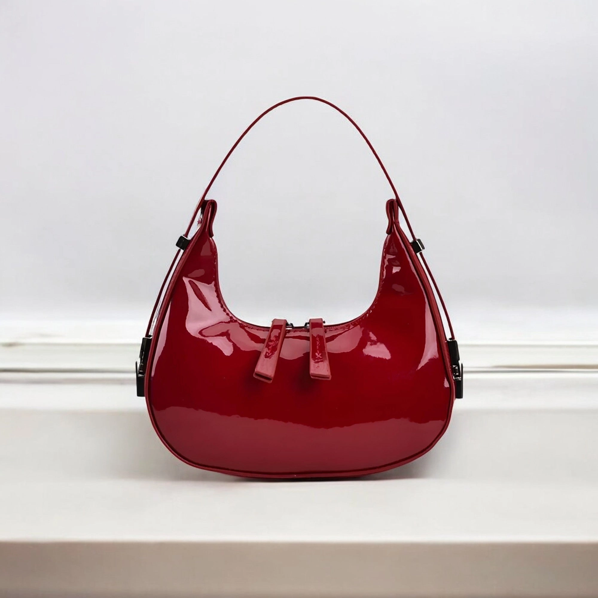 Timeless Design Lumi | Patent Leather Mini Hobo Bag ?C Glossy Finish & Curved Silhouette