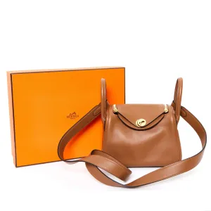 Minimalist crossbody bag Design Luxury HERMES Mini Lindy Clemence Gold GHW STAMP Y