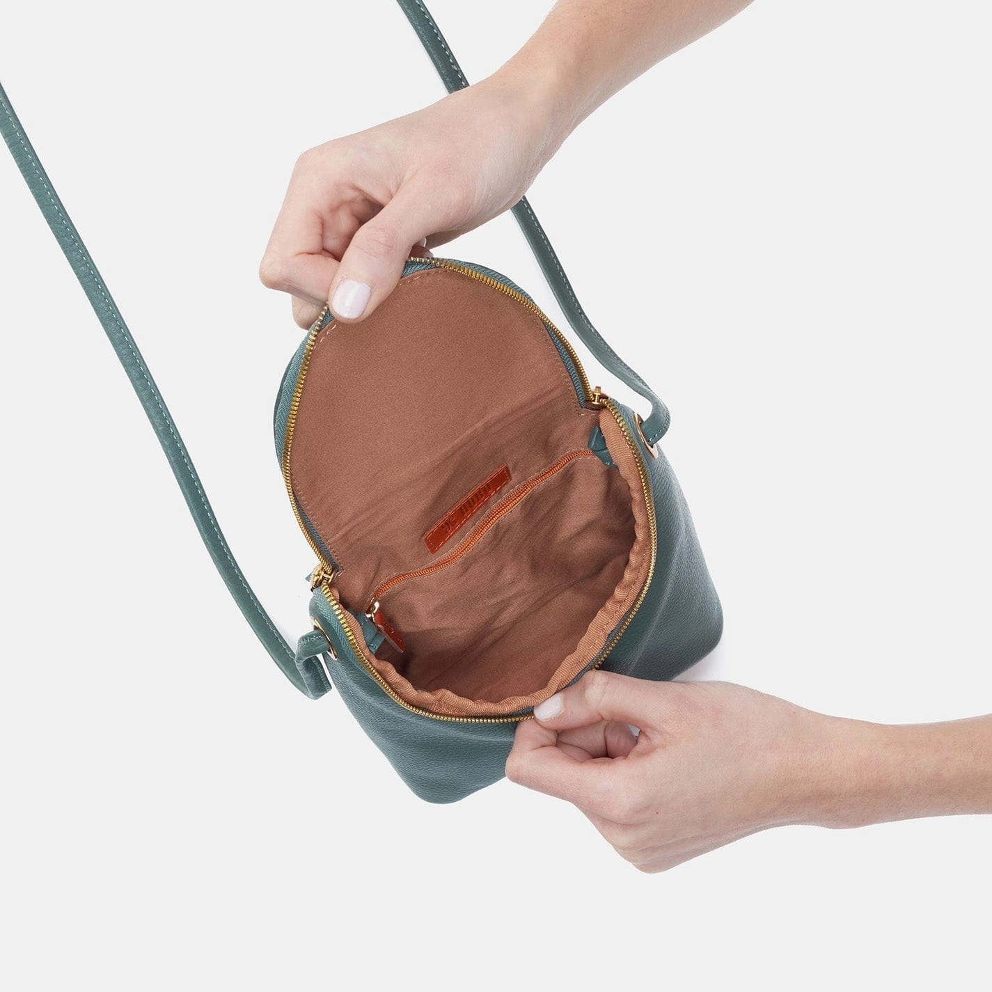 Minimalist Reliability Daily Functionality Hobo Fern Crossbody In Pebbled Leather