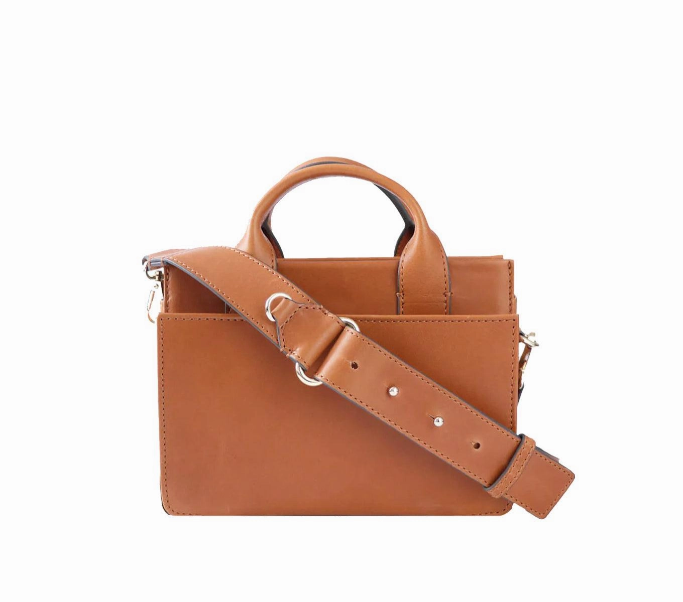 MINI VOYAGER SLING BAG Bold statement purse Trendy Daily