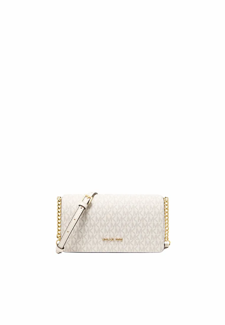 Functional compartments to keep your belongings neat and organized Soft Leather Texture Michael Kors Jet Set Medium Crossbody Bag Signature Logo In Light Cream Multi 35F5GTVC8B