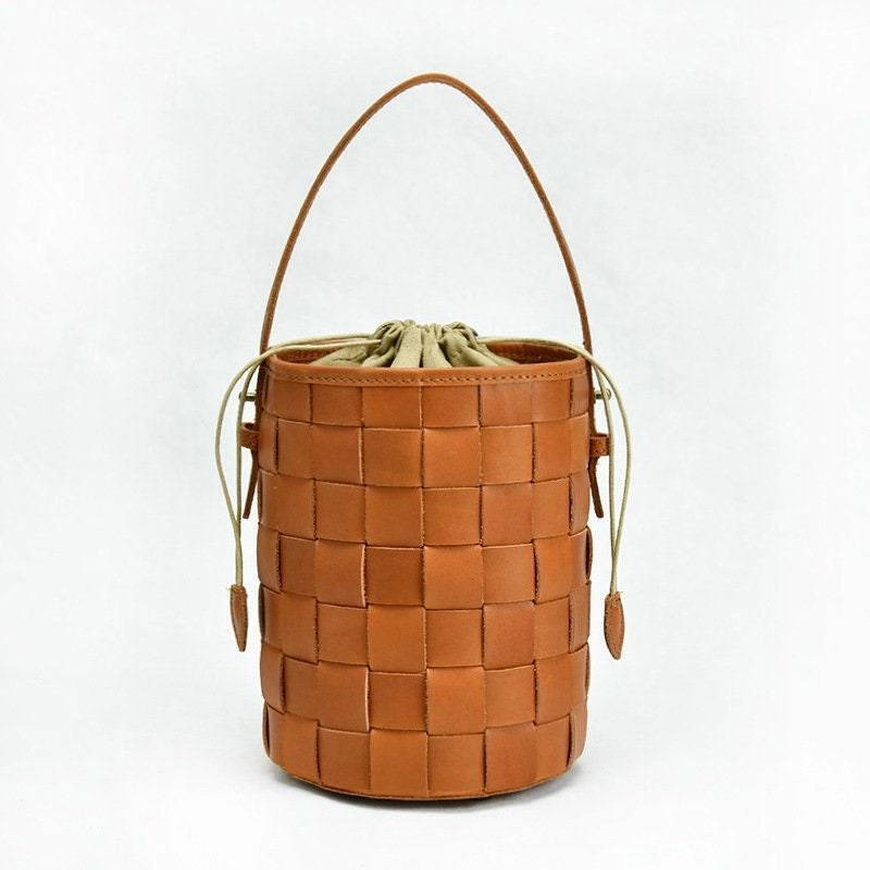 Modern Companion Woven Leather Bucket Bag In Tan, Handcrafted Woven Shoulder Bag, Woven Designer Bag, Handmade Shoulder Bag, Modern Leather Crossbody Bag